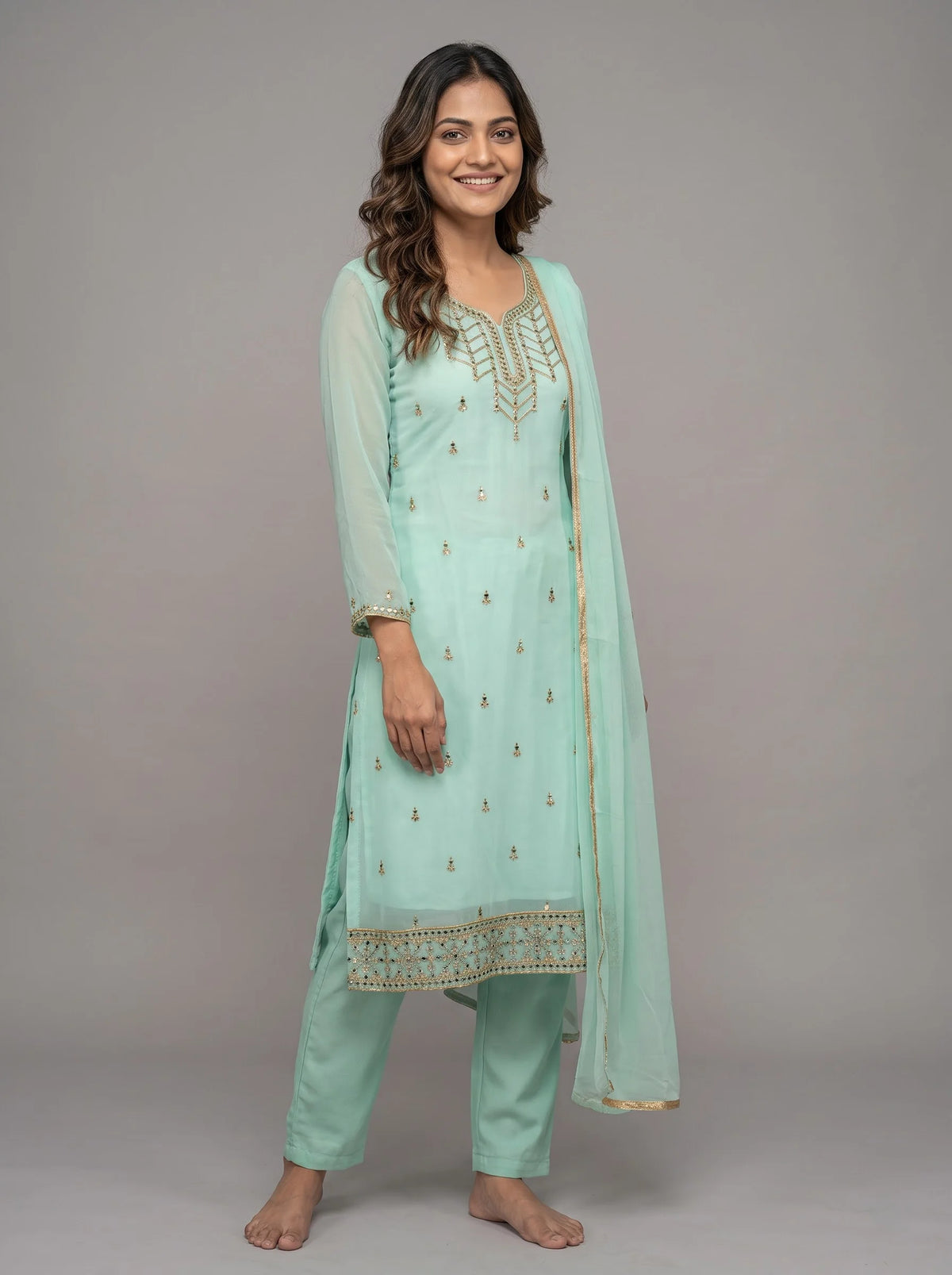 Mint Green Semi-Stitched Pakistani Suit with Heavy Neck & Daman Embroidery