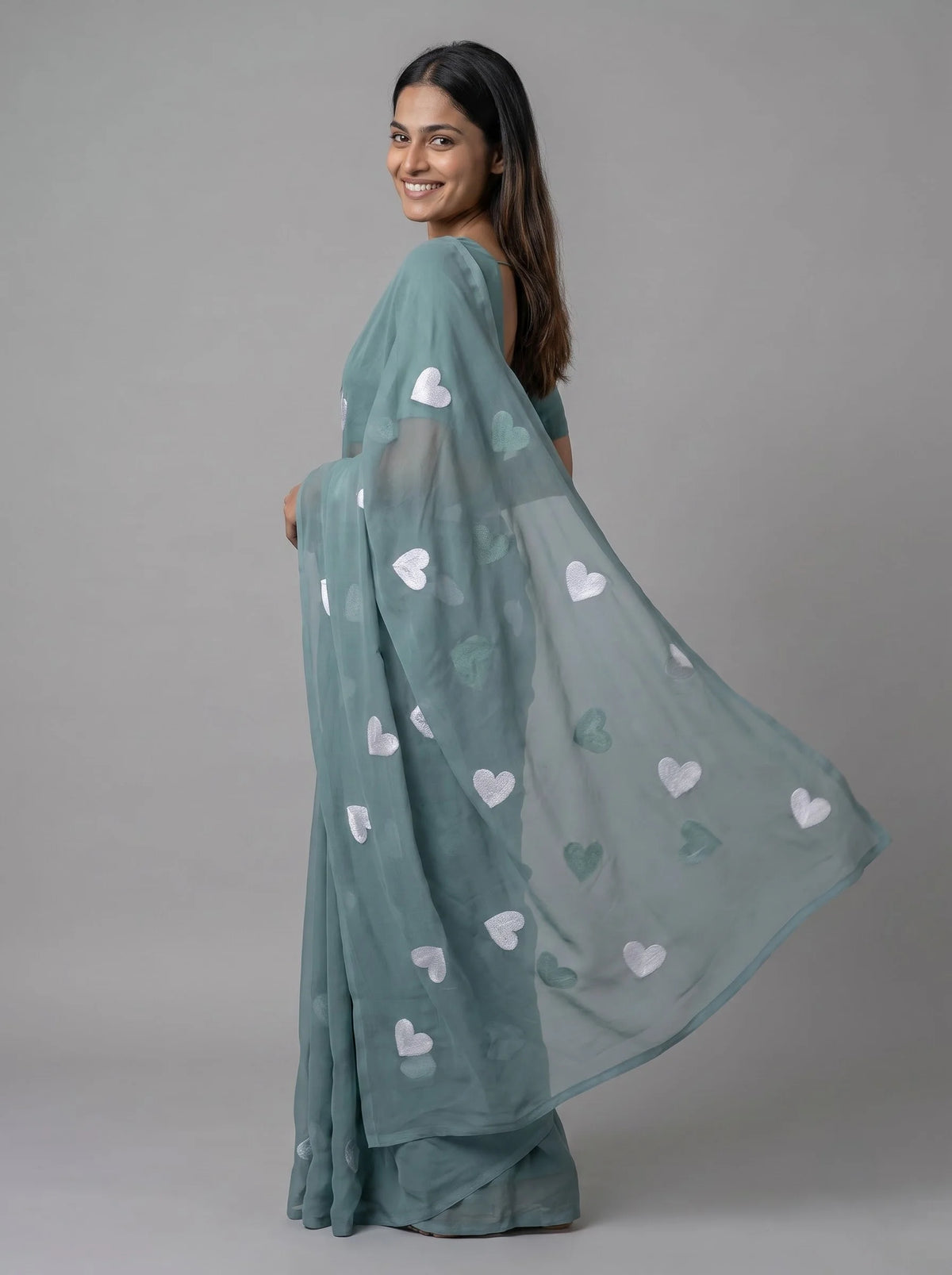 Sea Green Georgette Saree with All-Over Heart Embroidery