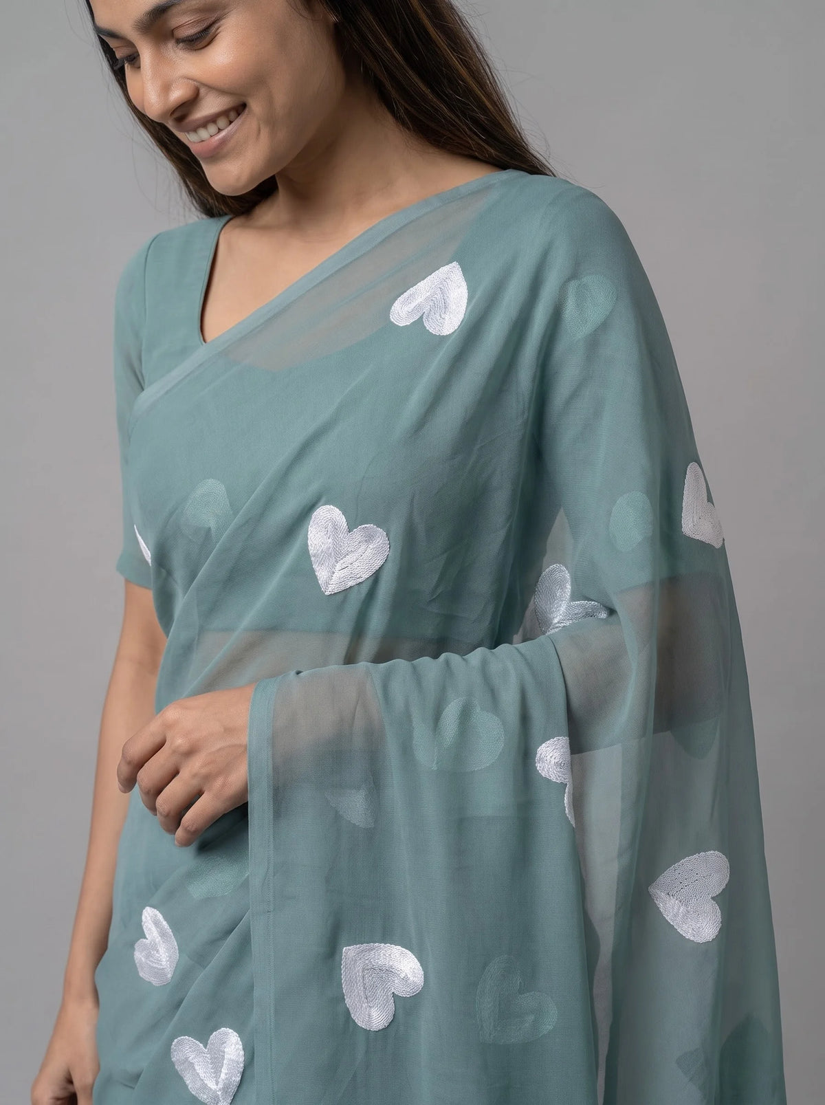 Sea Green Georgette Saree with All-Over Heart Embroidery