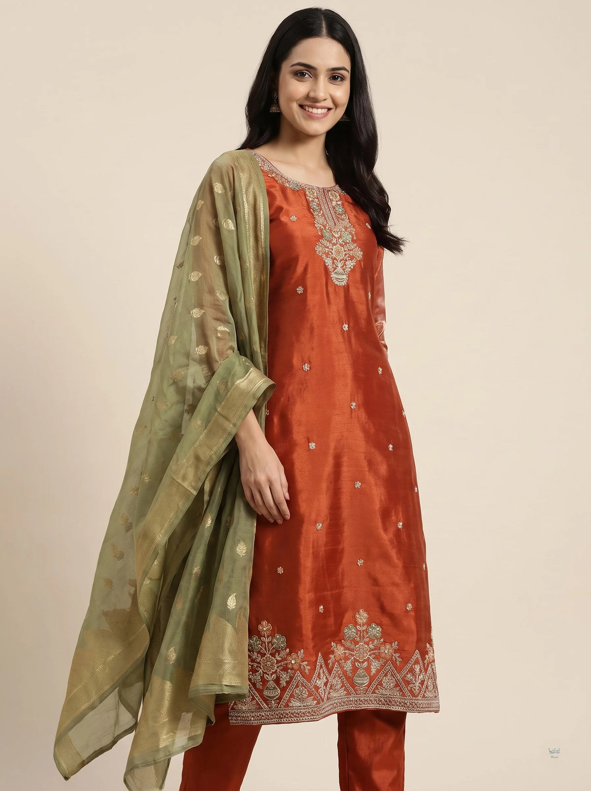 Rust Orange Gajji Satin Suit with Heavy Neck & Daman Embroidery
